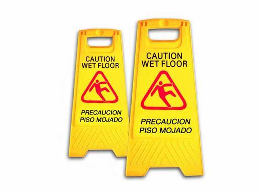Letrero piso mojado